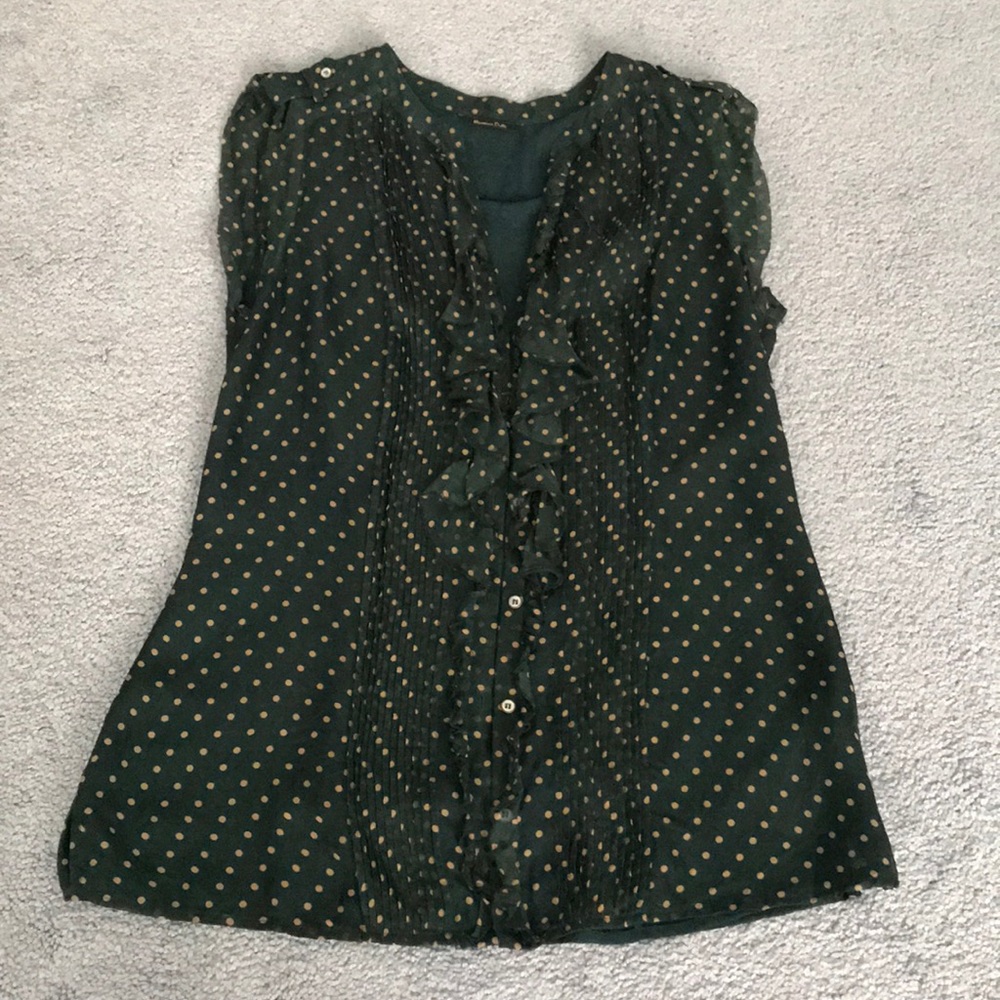 Green and gold polka dot sleeveless blouse